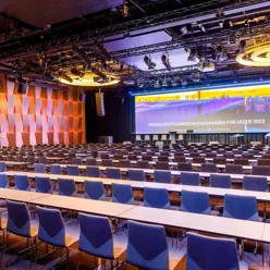 Konferansesal uten deltakere fra spesialistutdanningskonferansen 2022